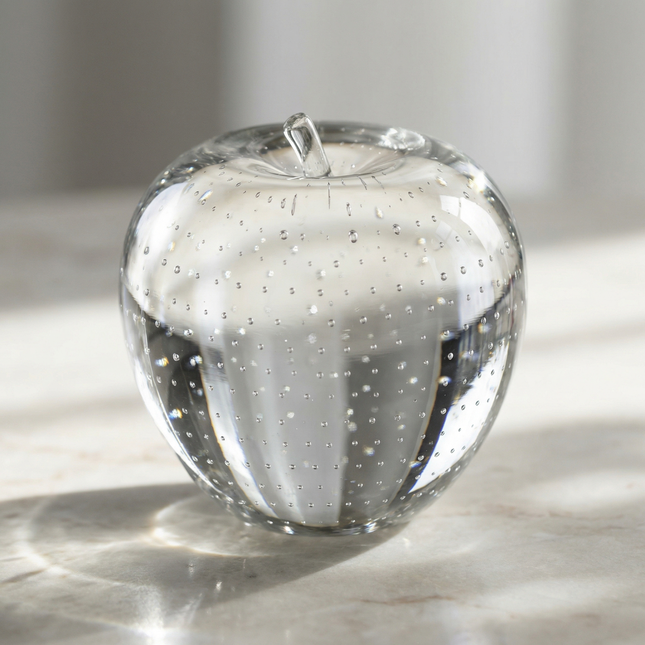 Translucent glass fruit: transparent glass texture with fine internal bubbles, surface highlights flowing under sharp lighting, macro lens capturing every refraction detail